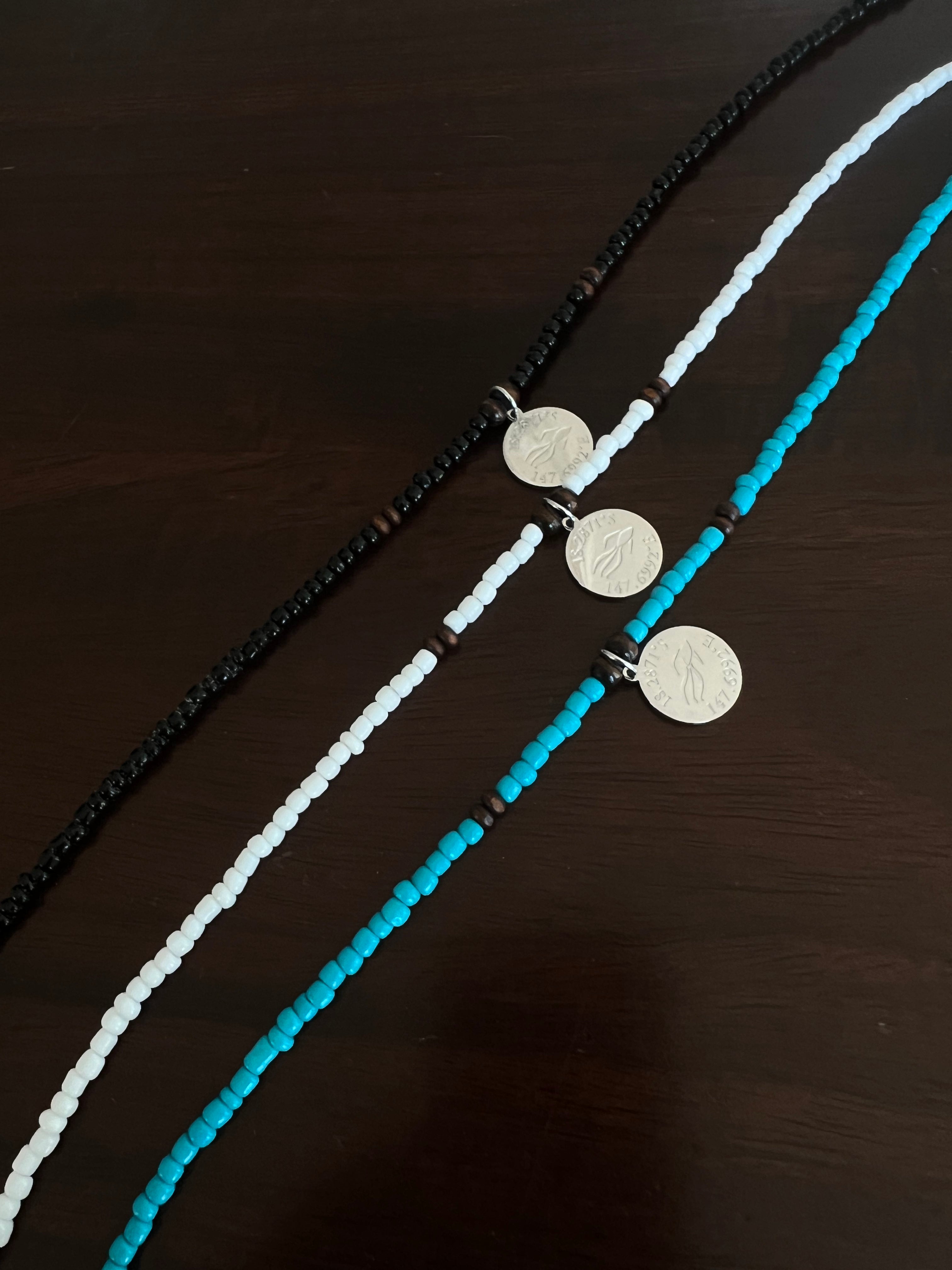 Aquarius Reef beaded choker necklaces. The three chokers that started the brand, 'Coconut', 'Reef', and 'Dare'.