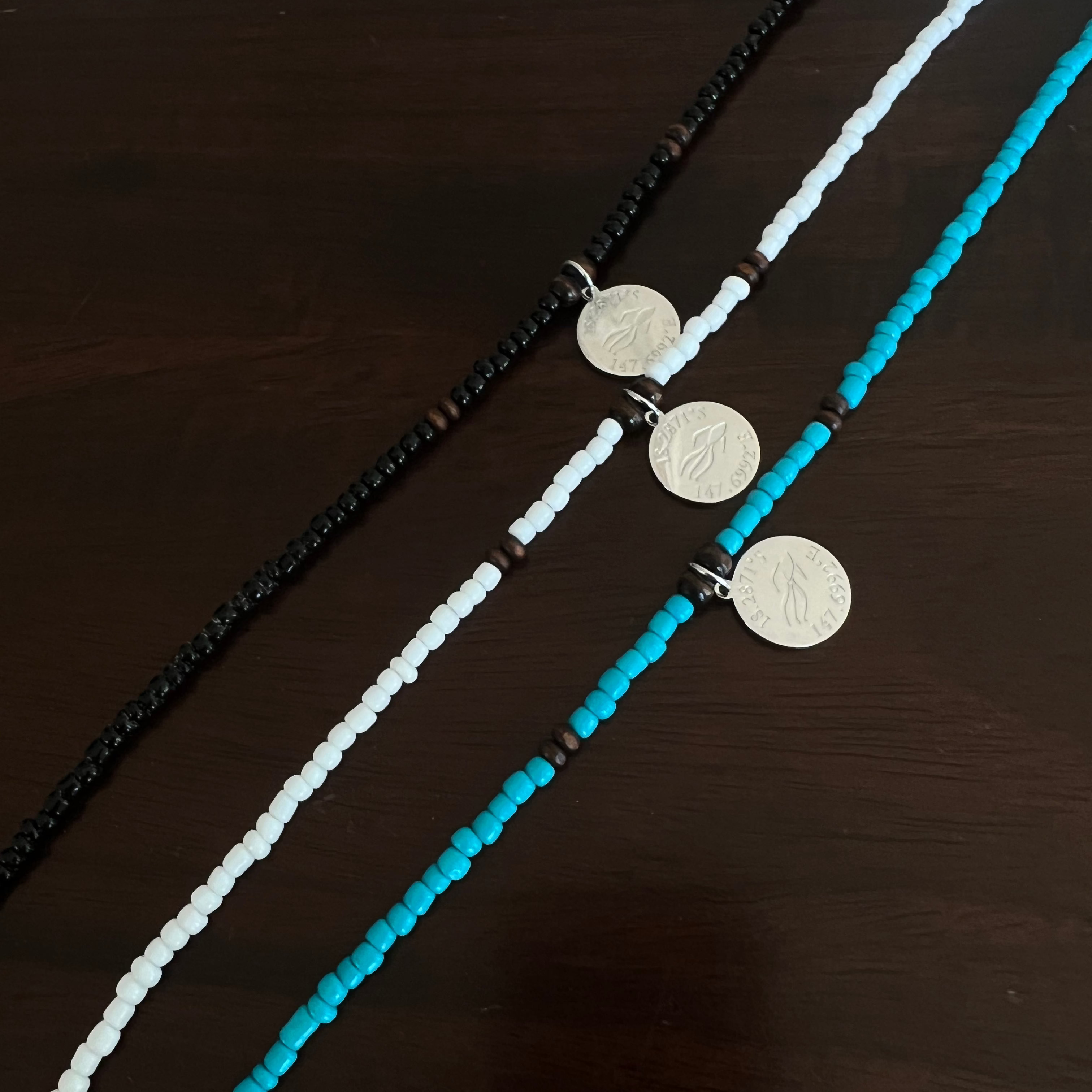 Aquarius Reef beaded choker necklaces. The three chokers that started the brand, 'Coconut', 'Reef', and 'Dare'.