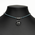 Aquarius Reef's 'Cobra' choker - a blue pearl and silver unisex beaded choker necklace from Aquarius Reef's Pearl collection, featuring a pendant with coordinates of the Great Barrier Reef.
