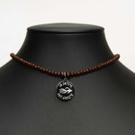 Aquarius Reef's silver 'Intimate' choker - a brown unisex beaded choker necklace in silver from Aquarius Reef's Classic collection, featuring a pendant with coordinates of the Great Barrier Reef.