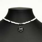 Aquarius Reef's silver 'Posh' choker - a white and silver unisex seed beaded choker necklace from Aquarius Reef's Edge collection, featuring a pendant with coordinates of the Great Barrier Reef.