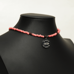 Aquarius Reef's 'Betta' choker - a coral pink unisex beaded choker necklace in silver from Aquarius Reef's Classic collection, featuring a pendant with coordinates of the Great Barrier Reef.