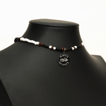 Aquarius Reef's silver 'Sparrow' choker - a black and white patterned unisex seed beaded choker necklace in gold from Aquarius Reef's Edge collection, featuring a pendant with coordinates of the Great Barrier Reef.